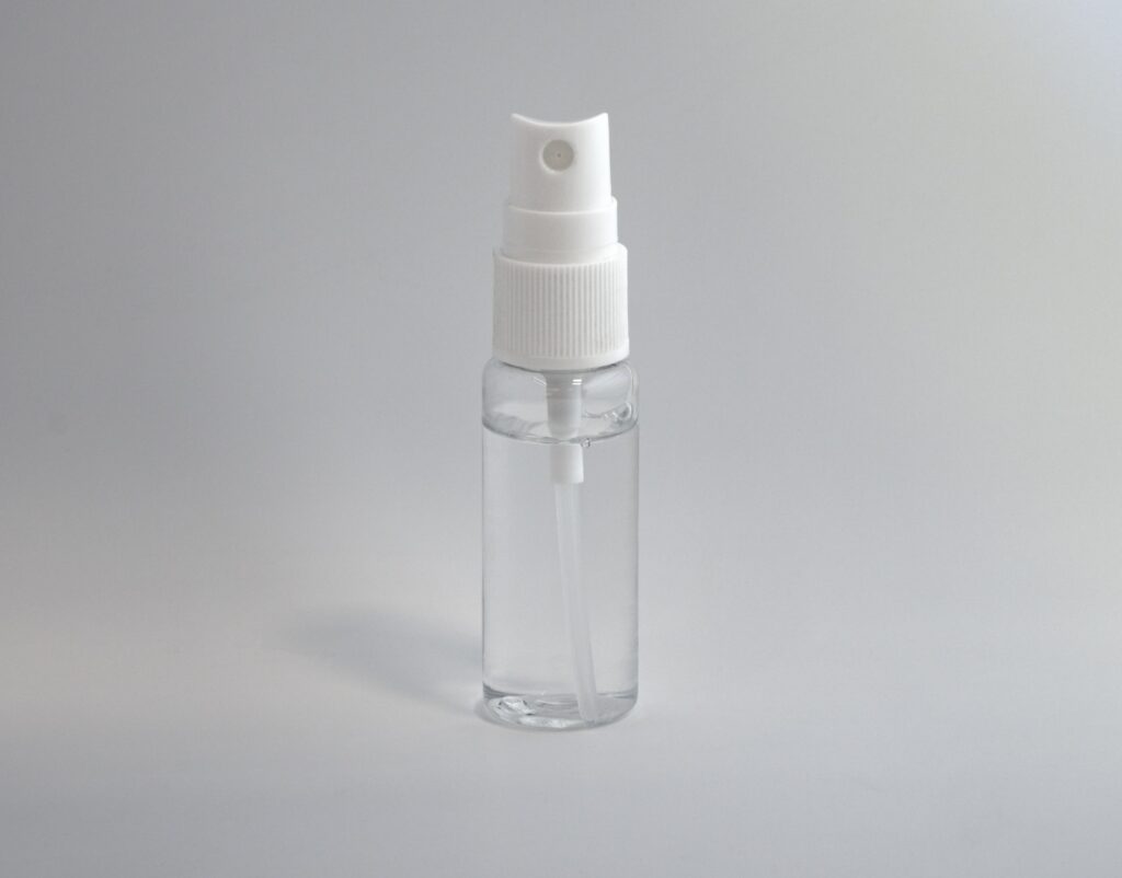 clear and white spray bottle